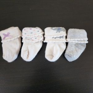 3/$12 ● 4 pairs of socks 0-3m